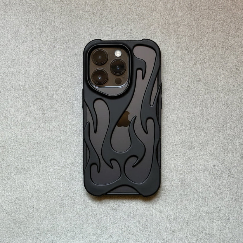 Black phone case with flame design on a light gray surface